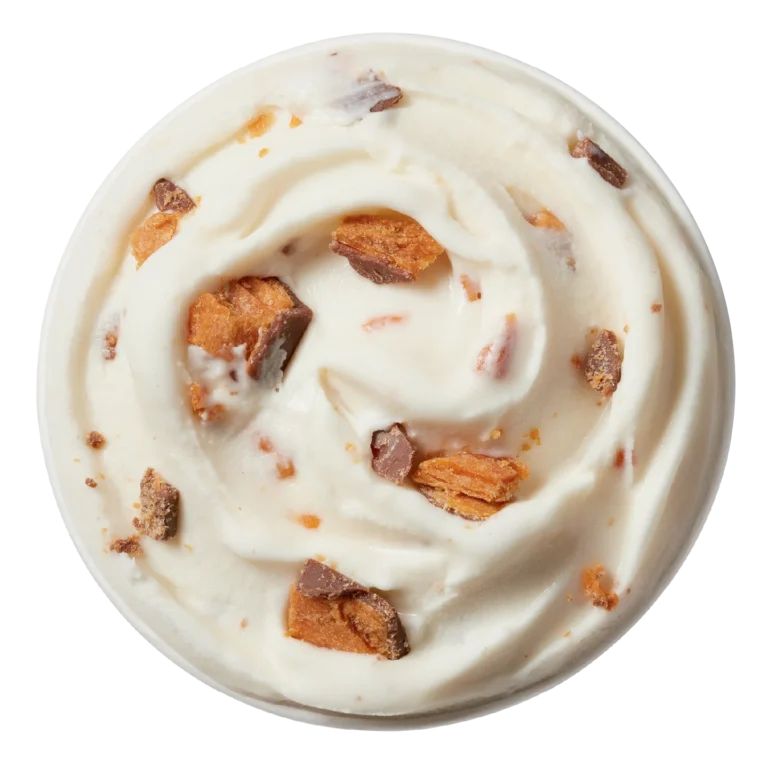 single Butterfinger Blizzard treat in clear cup with crushed Butterfinger pieces