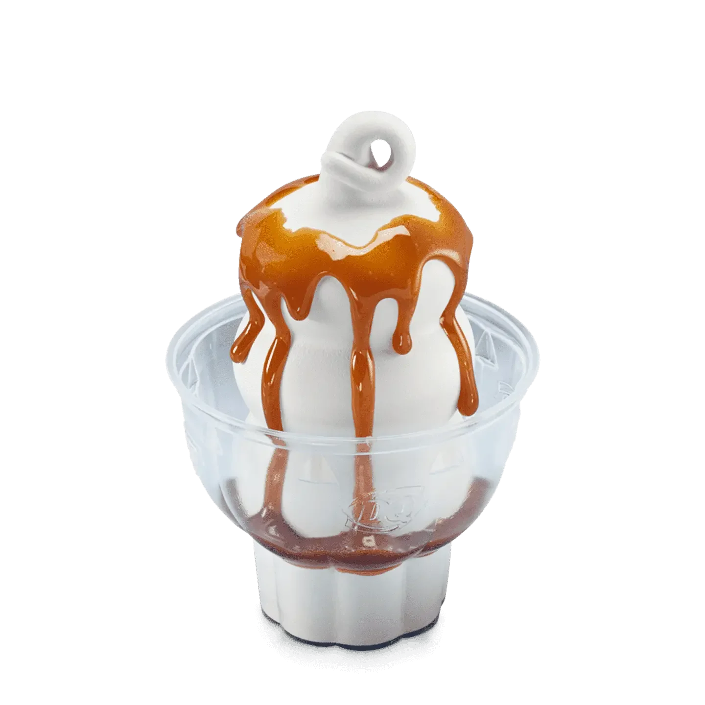 vanilla soft serve sundae topped with caramel sauce in a white cup