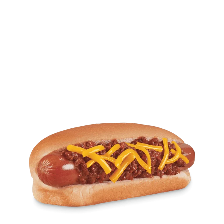 Hot dog in bun topped with chili and shredded cheese