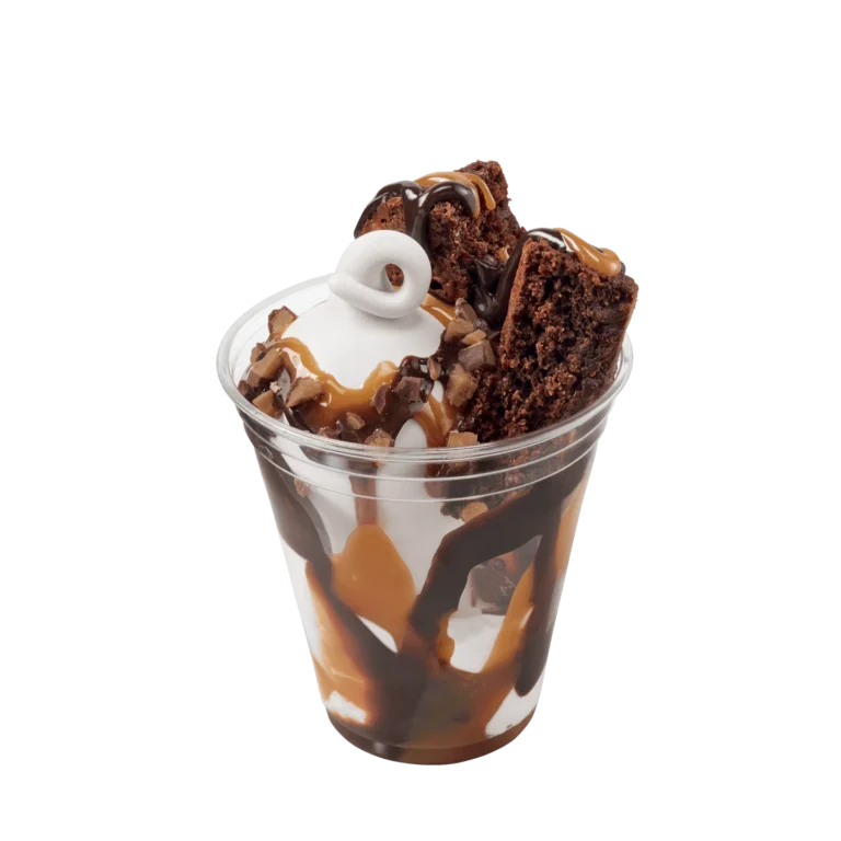 brownie pieces with vanilla soft serve, caramel, Heath topping in a cup
