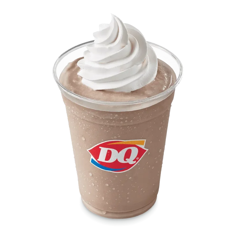 Hot Fudge Shake in a clear cup topped with whipped topping