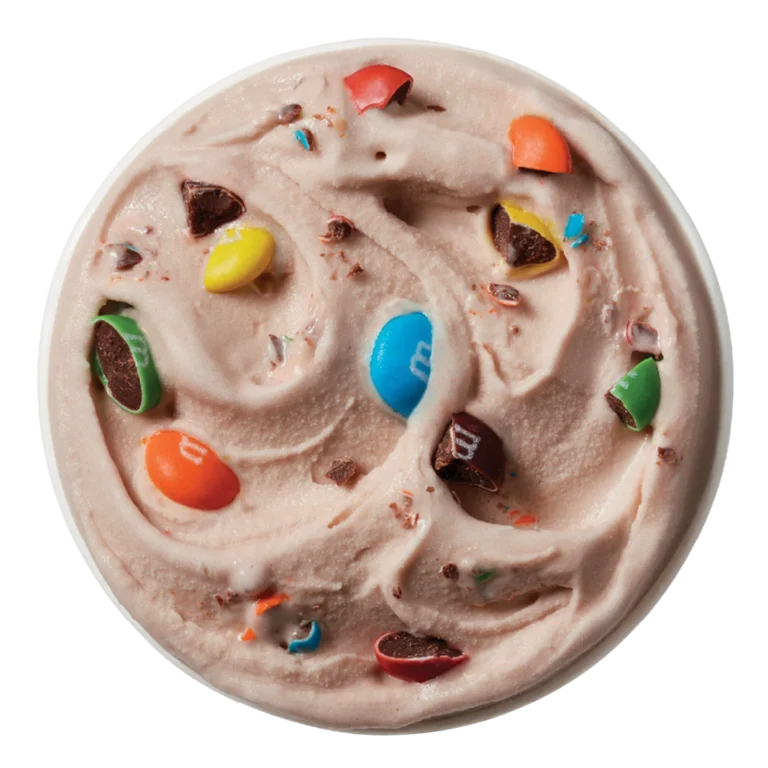 single M&M's Milk Chocolate Candies Blizzard treat in clear cup with colorful candy pieces
