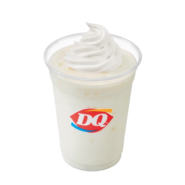 Single maple cookie shake with whipped topping in a clear cup