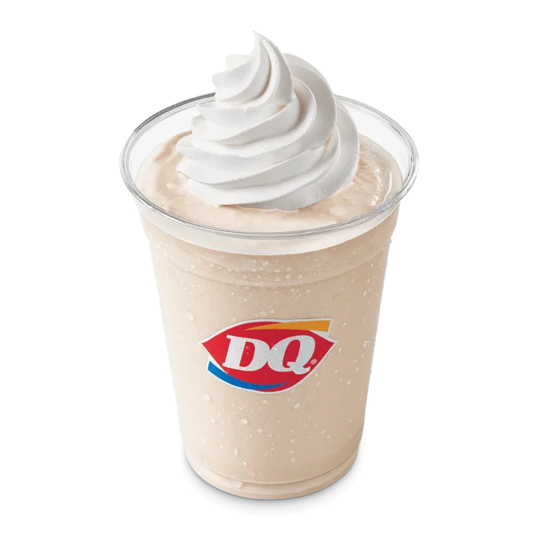 Peanut Butter Shake in a clear cup with whipped topping