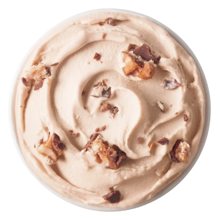 single Snickers Blizzard treat in clear cup with peanuts and caramel swirl