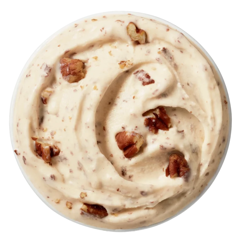 single Turtle Pecan Cluster Blizzard in a clear cup with caramel and pecans