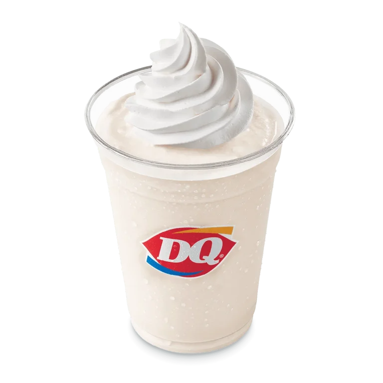 Vanilla Shake in a clear cup with whipped topping