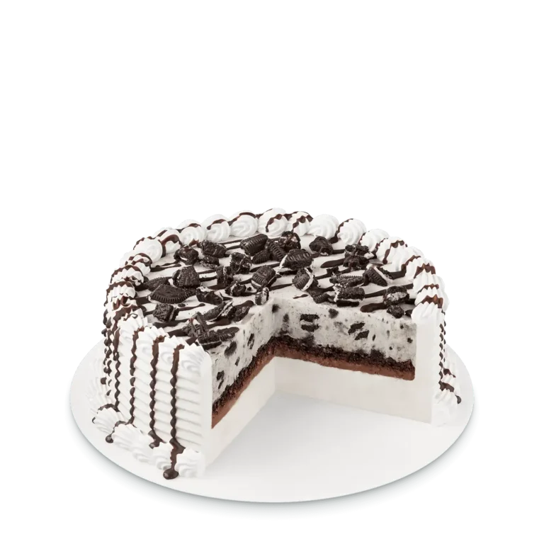 round cake with Oreo pieces inside and white icing on top